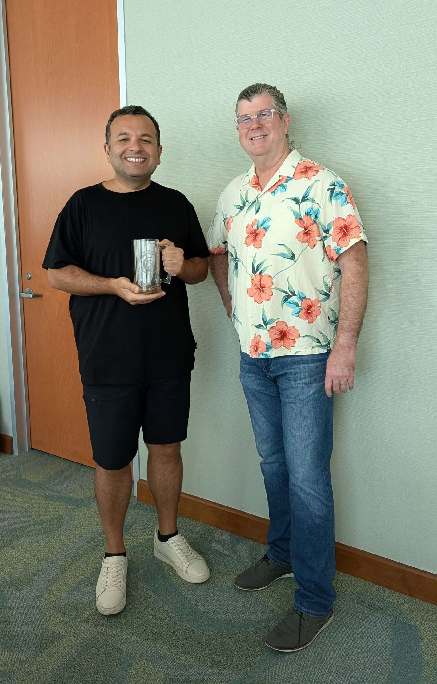 Ulas Bagci with their AI PHI beer stein